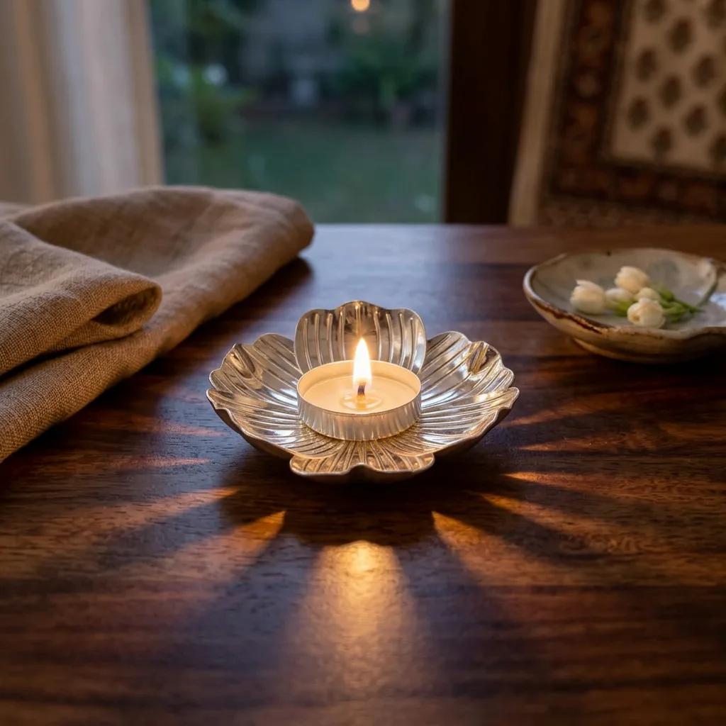 Silver plated flower tea-light holder, lit