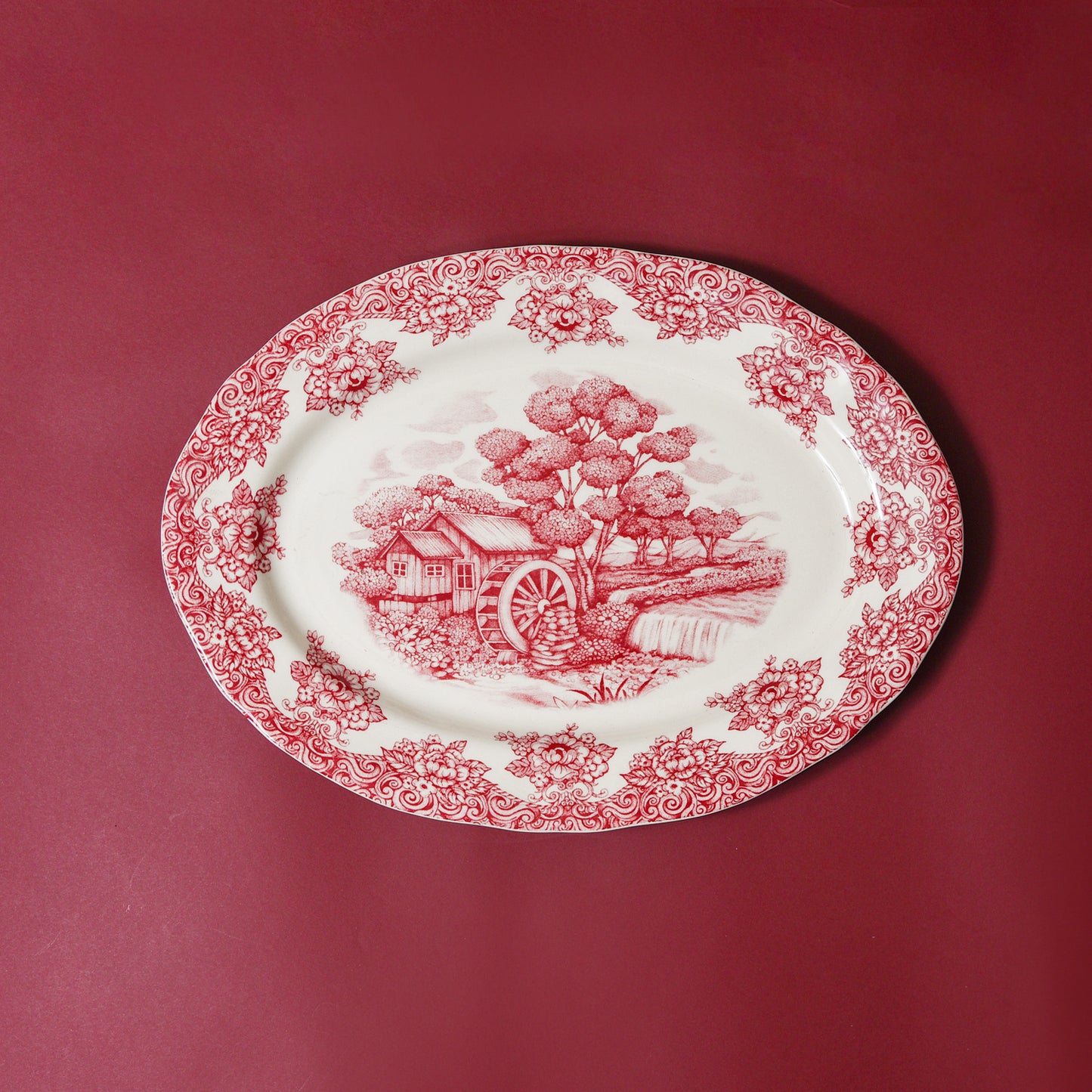Waterwheel Cranberry Oval Platter