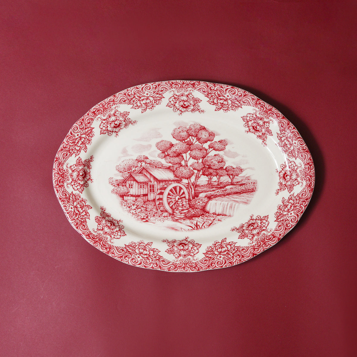Waterwheel Cranberry Oval Platter – hand-painted serveware by Cavalry Lane